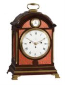 A George III brass mounted mahogany musical table clock with fired enamel dials