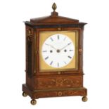 A fine Regency brass inlaid rosewood bracket clock with trip-hour repeat and fired enamel dial