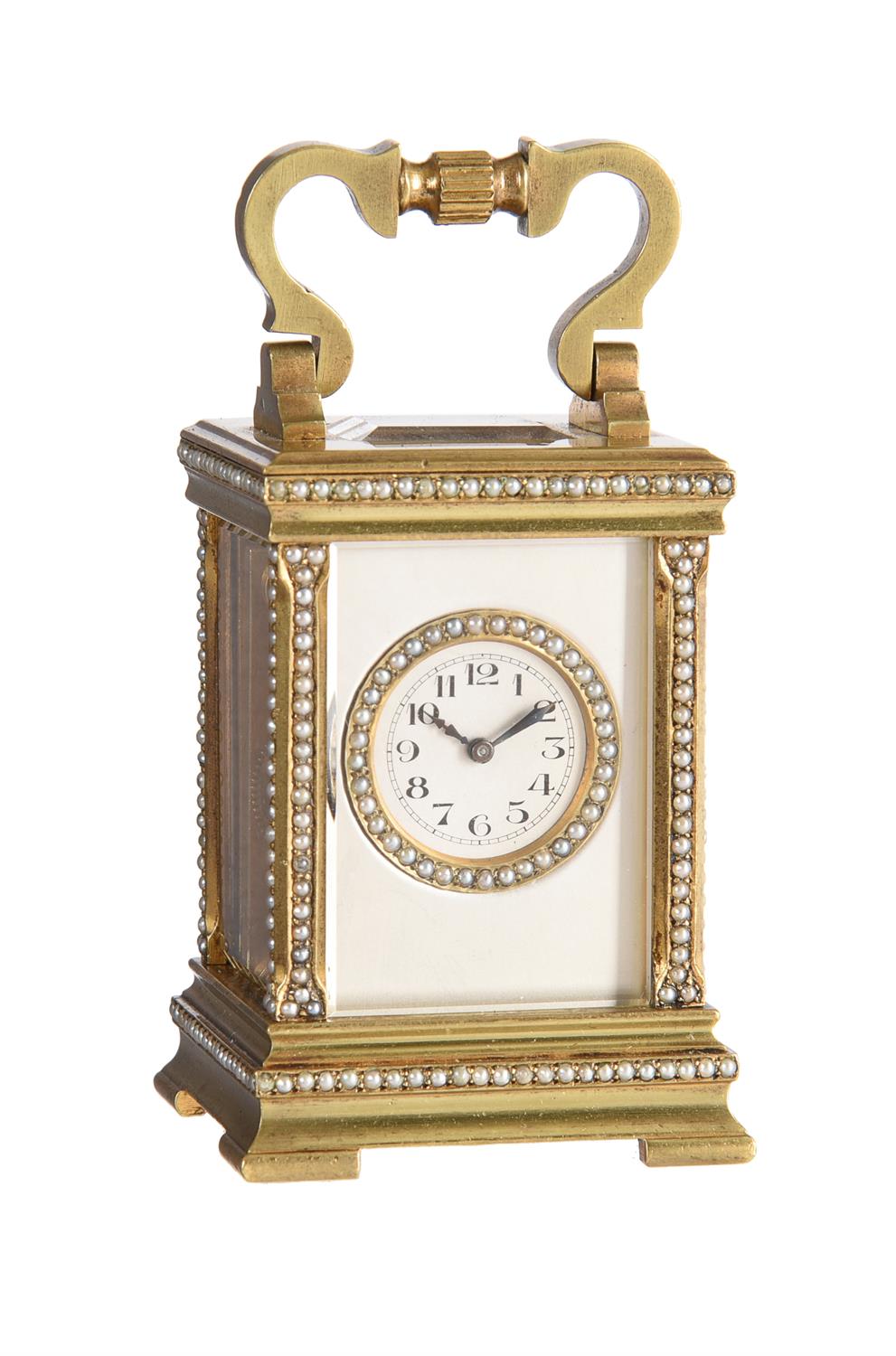 An unusual French split-pearl decorated gilt brass decorated miniature carriage timepiece