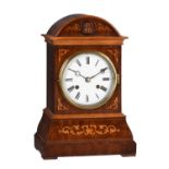 A rare German Black Forest inlaid mahogany spring-driven musical cuckoo mantel clock