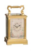 Y A French gilt brass carriage clock with painted ivory panels and push-button repeat