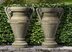 A pair of Italian carved Istrian stone urns