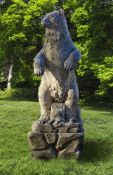A sculpted limestone model of a Grizzly Bear