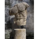 A sculpted limestone model of a male torso, after the manner of the Gaddi Torso