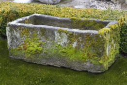 A carved limestone trough