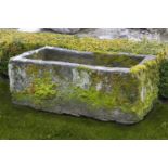 A carved limestone trough