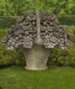 A large Continental sculpted limestone pier ornament modelled as a basket of flowers