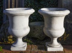 A pair of sculpted carrara marble campagna vases