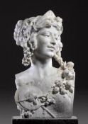 A French sculpted white marble bust of a Bacchante