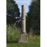 A French Bourgogne limestone column on plinth