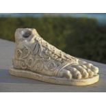 A sculpted marble model of a foot