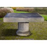 A Belgian bluestone pedestal garden table