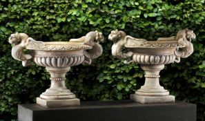 A pair of Continental sculpted white marble garden urns in Neoclassical style