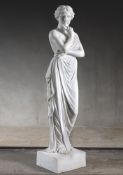 A sculpted white marble figure of a maiden in neo-classical taste