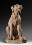 A Venetian terracotta model of a seated hound