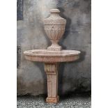 A Continental carved pink limestone fountain