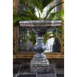 A carved green marble fountain