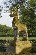 A large and impressive sculpted limestone and antler mounted model of a stag