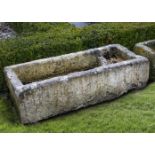 A carved limestone trough