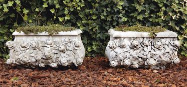 A pair of carved Carrara marble planters
