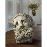 A colossal sculpted white marble model of the head of Hercules