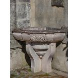 A French limestone corner wall fountain basin