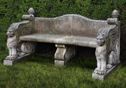 A carved limestone garden seat in 18th century style