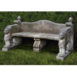 A carved limestone garden seat in 18th century style