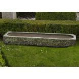 A carved limestone trough