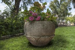 A carved limestone planter