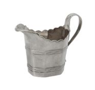 A George III silver octagonal cream jug by Charles Chesterman II