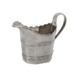 A George III silver octagonal cream jug by Charles Chesterman II