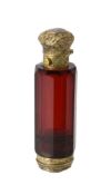 A cased silver gilt and red glass scent bottle and vinaigrette