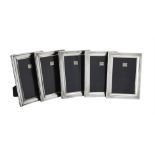 Five silver mounted rectangular photo frames