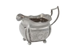 A George III Irish silver rectangular cream jug by Richard Sawyer