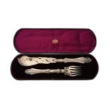 A cased pair of Victorian silver fish servers by Hilliard & Thomason