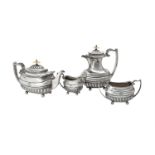 Y A silver four piece oblong baluster tea set by Walker & Hall