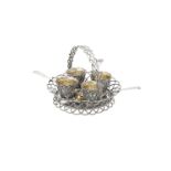 A Victorian silver circular egg cup basket by Edward, Edward junior, John & William Barnard