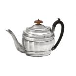 Y A George III silver oval fluted baluster tea pot by Stephen Adams II