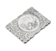 An Edwardian silver shaped rectangular card case by William M. Hayes