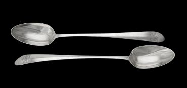 A pair of George III Irish silver pointed Old English pattern serving spoons by John Shiels