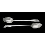 A pair of George III Irish silver pointed Old English pattern serving spoons by John Shiels