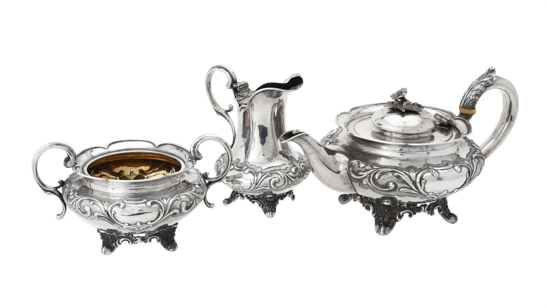 Y A Victorian silver three piece circular tea set by Benjamin Smith III