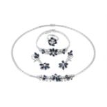 A sapphire and diamond necklace, ring, bracelet and earrings suite