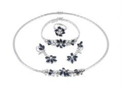 A sapphire and diamond necklace, ring, bracelet and earrings suite