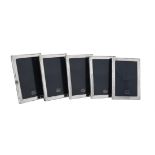 Five silver mounted rectangular photo frames by Kitney & Co.