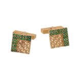 A pair of emerald cufflinks