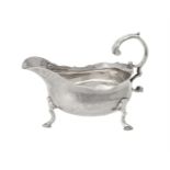 An early George III silver oval sauce boat by John Muns