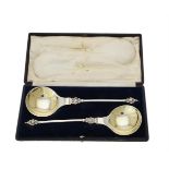 A cased pair of Victorian silver anointing spoons by John Aldwinkle & James Slater