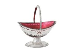 A George III silver oval swing handled basket by Solomon Hougham